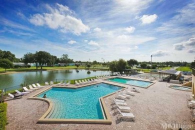 This waterfront 1792 sq ft 3 bedroom manufactured home is in 55+ on Schalamar Creek Golf and Country Club in Florida - for sale on GolfHomes.com, golf home, golf lot