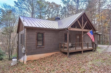 Nestled in the serene beauty of the North Georgia mountains on White Path Golf Club in Georgia - for sale on GolfHomes.com, golf home, golf lot