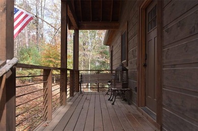 Nestled in the serene beauty of the North Georgia mountains on White Path Golf Club in Georgia - for sale on GolfHomes.com, golf home, golf lot
