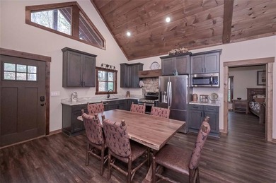 Nestled in the serene beauty of the North Georgia mountains on White Path Golf Club in Georgia - for sale on GolfHomes.com, golf home, golf lot