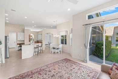 Natural light floods this 3 bedroom PLUS DEN / 2  Bathroom  home on Westchester Golf and Country Club in Florida - for sale on GolfHomes.com, golf home, golf lot
