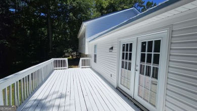 Welcome home to 389 Waxwing Drive!! Adorable renovated tri-level on Turtle Cove Golf Course in Georgia - for sale on GolfHomes.com, golf home, golf lot