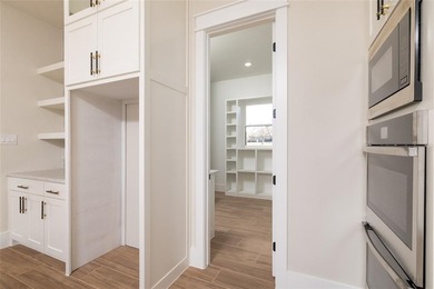 This exceptional 4-bedroom, 3.5-bath luxury modern farmhouse on Nutcracker Golf Club in Texas - for sale on GolfHomes.com, golf home, golf lot