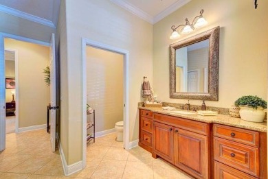 Exquisite townhouse with uniquely designed lagoon pool located on Spessard Holland Golf Course in Florida - for sale on GolfHomes.com, golf home, golf lot