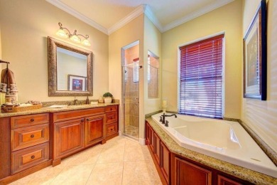 Exquisite townhouse with uniquely designed lagoon pool located on Spessard Holland Golf Course in Florida - for sale on GolfHomes.com, golf home, golf lot