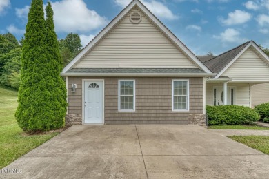 Welcome to this beautifully maintained 4-bedroom, 2-bathroom on Country Club of Bristol in Tennessee - for sale on GolfHomes.com, golf home, golf lot