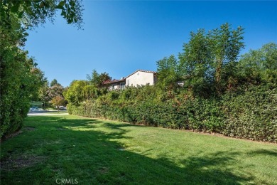 This Valencia Woodlands Ironwood pool home offers a rare large on Valencia Country Club in California - for sale on GolfHomes.com, golf home, golf lot