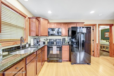 STR Opportunity! Approx 100k in revenues. Warm, inviting, and on Split Rock Resort and Country Club in Pennsylvania - for sale on GolfHomes.com, golf home, golf lot