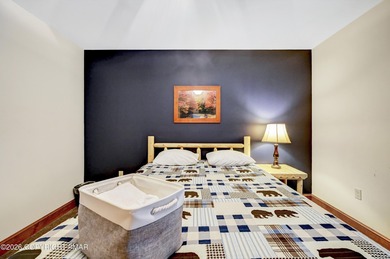 STR Opportunity! Approx 100k in revenues. Warm, inviting, and on Split Rock Resort and Country Club in Pennsylvania - for sale on GolfHomes.com, golf home, golf lot