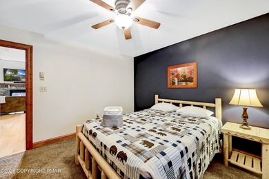 STR Opportunity! Approx 100k in revenues. Warm, inviting, and on Split Rock Resort and Country Club in Pennsylvania - for sale on GolfHomes.com, golf home, golf lot