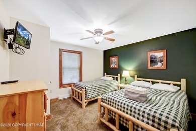 STR Opportunity! Approx 100k in revenues. Warm, inviting, and on Split Rock Resort and Country Club in Pennsylvania - for sale on GolfHomes.com, golf home, golf lot