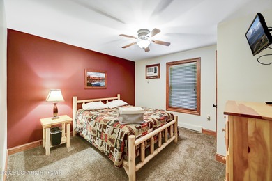 STR Opportunity! Approx 100k in revenues. Warm, inviting, and on Split Rock Resort and Country Club in Pennsylvania - for sale on GolfHomes.com, golf home, golf lot