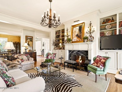 Situated on a quiet cul-de-sac overlooking the 9th tee of on Greenville Country Club in North Carolina - for sale on GolfHomes.com, golf home, golf lot