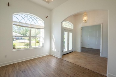 Beautiful 4-bedroom, 3-bathroom home on an oversized lot in on The Grand Club Cypress Course in Florida - for sale on GolfHomes.com, golf home, golf lot