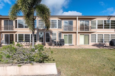 This charming, 2-bedroom, 2-bath condo is located in the very on East Bay Golf Club in Florida - for sale on GolfHomes.com, golf home, golf lot