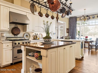 Situated on a quiet cul-de-sac overlooking the 9th tee of on Greenville Country Club in North Carolina - for sale on GolfHomes.com, golf home, golf lot