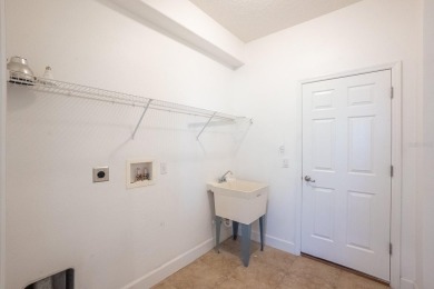 Beautiful 4-bedroom, 3-bathroom home on an oversized lot in on The Grand Club Cypress Course in Florida - for sale on GolfHomes.com, golf home, golf lot