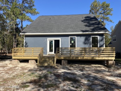 NEW CONSTRUCTION!! Welcome to a beautiful 5 bedroom, 3 1/2 on Woodlake Country Club in North Carolina - for sale on GolfHomes.com, golf home, golf lot