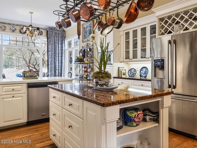 Situated on a quiet cul-de-sac overlooking the 9th tee of on Greenville Country Club in North Carolina - for sale on GolfHomes.com, golf home, golf lot