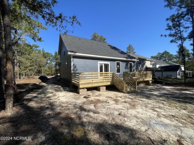 NEW CONSTRUCTION!! Welcome to a beautiful 5 bedroom, 3 1/2 on Woodlake Country Club in North Carolina - for sale on GolfHomes.com, golf home, golf lot