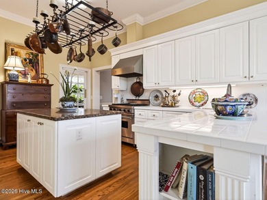 Situated on a quiet cul-de-sac overlooking the 9th tee of on Greenville Country Club in North Carolina - for sale on GolfHomes.com, golf home, golf lot