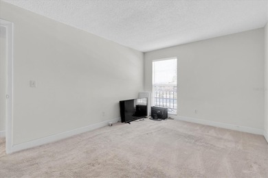 This charming, 2-bedroom, 2-bath condo is located in the very on East Bay Golf Club in Florida - for sale on GolfHomes.com, golf home, golf lot