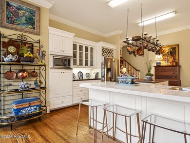 Situated on a quiet cul-de-sac overlooking the 9th tee of on Greenville Country Club in North Carolina - for sale on GolfHomes.com, golf home, golf lot