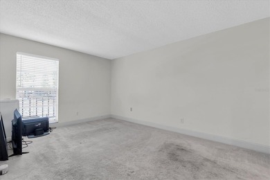 This charming, 2-bedroom, 2-bath condo is located in the very on East Bay Golf Club in Florida - for sale on GolfHomes.com, golf home, golf lot