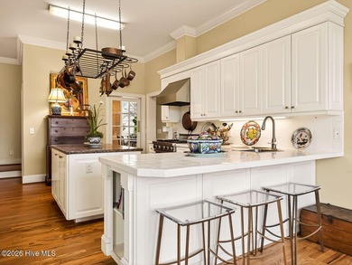 Situated on a quiet cul-de-sac overlooking the 9th tee of on Greenville Country Club in North Carolina - for sale on GolfHomes.com, golf home, golf lot