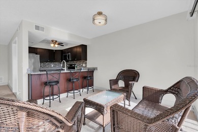 This charming, 2-bedroom, 2-bath condo is located in the very on East Bay Golf Club in Florida - for sale on GolfHomes.com, golf home, golf lot