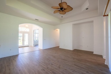 Beautiful 4-bedroom, 3-bathroom home on an oversized lot in on The Grand Club Cypress Course in Florida - for sale on GolfHomes.com, golf home, golf lot