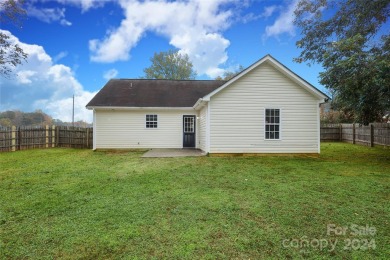 Welcome to Radio Rd. This charming, newly remodeled, turn-key on Sunset Hills Golf Course - Sunset Hills in North Carolina - for sale on GolfHomes.com, golf home, golf lot