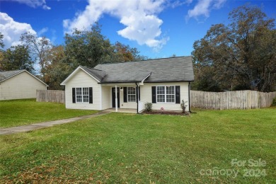 Welcome to Radio Rd. This charming, newly remodeled, turn-key on Sunset Hills Golf Course - Sunset Hills in North Carolina - for sale on GolfHomes.com, golf home, golf lot