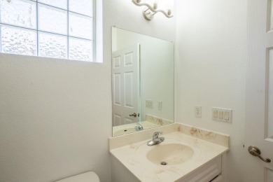 Beautiful 4-bedroom, 3-bathroom home on an oversized lot in on The Grand Club Cypress Course in Florida - for sale on GolfHomes.com, golf home, golf lot