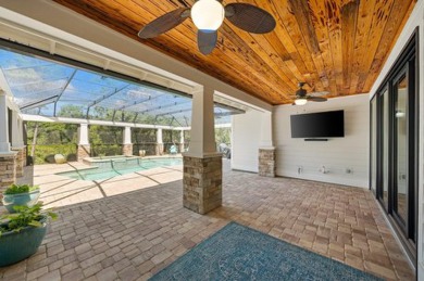 Welcome home to your own oasis!1732 Lost Cove Lane offers on Sharks Tooth Golf Club in Florida - for sale on GolfHomes.com, golf home, golf lot