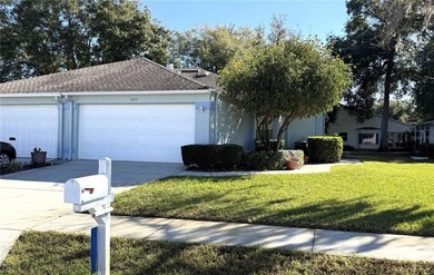 Welcome to 13335 Norman Cir, Hudson, a beautifully maintained on Meadow Oaks Golf and Country Club in Florida - for sale on GolfHomes.com, golf home, golf lot