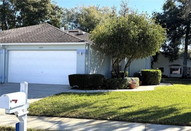 Welcome to 13335 Norman Cir, Hudson, a beautifully maintained on Meadow Oaks Golf and Country Club in Florida - for sale on GolfHomes.com, golf home, golf lot