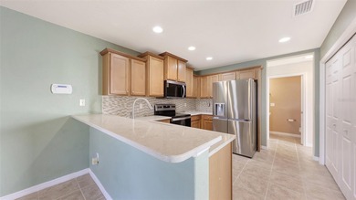 This 3 bedroom 2 1/2 bath home sits on a desirable lake lot with on Stoneybrook Golf Club At Heritage Harbour in Florida - for sale on GolfHomes.com, golf home, golf lot