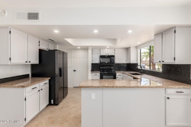 Welcome to Kimberly Way.  This stunning remodel is turn key and on Westbrook Village Golf Club in Arizona - for sale on GolfHomes.com, golf home, golf lot