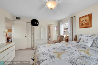 Beautiful, turn key, top corner condo, fully furnished located on Sunrise Lakes Phase III in Florida - for sale on GolfHomes.com, golf home, golf lot