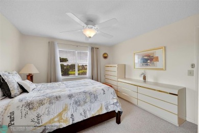 Beautiful, turn key, top corner condo, fully furnished located on Sunrise Lakes Phase III in Florida - for sale on GolfHomes.com, golf home, golf lot