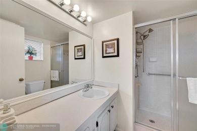 Beautiful, turn key, top corner condo, fully furnished located on Sunrise Lakes Phase III in Florida - for sale on GolfHomes.com, golf home, golf lot