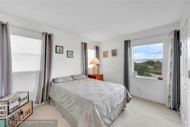 Beautiful, turn key, top corner condo, fully furnished located on Sunrise Lakes Phase III in Florida - for sale on GolfHomes.com, golf home, golf lot