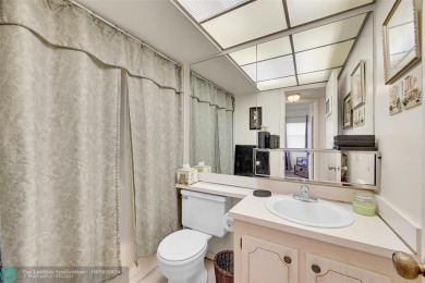 Beautiful, turn key, top corner condo, fully furnished located on Sunrise Lakes Phase III in Florida - for sale on GolfHomes.com, golf home, golf lot
