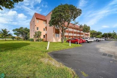 Beautiful, turn key, top corner condo, fully furnished located on Sunrise Lakes Phase III in Florida - for sale on GolfHomes.com, golf home, golf lot
