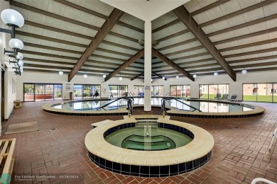 Beautiful, turn key, top corner condo, fully furnished located on Sunrise Lakes Phase III in Florida - for sale on GolfHomes.com, golf home, golf lot