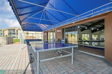 Beautiful, turn key, top corner condo, fully furnished located on Sunrise Lakes Phase III in Florida - for sale on GolfHomes.com, golf home, golf lot