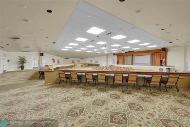 Beautiful, turn key, top corner condo, fully furnished located on Sunrise Lakes Phase III in Florida - for sale on GolfHomes.com, golf home, golf lot