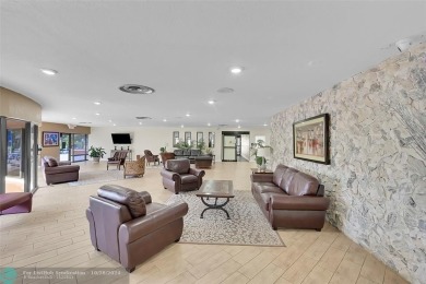 Beautiful, turn key, top corner condo, fully furnished located on Sunrise Lakes Phase III in Florida - for sale on GolfHomes.com, golf home, golf lot