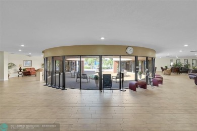 Beautiful, turn key, top corner condo, fully furnished located on Sunrise Lakes Phase III in Florida - for sale on GolfHomes.com, golf home, golf lot